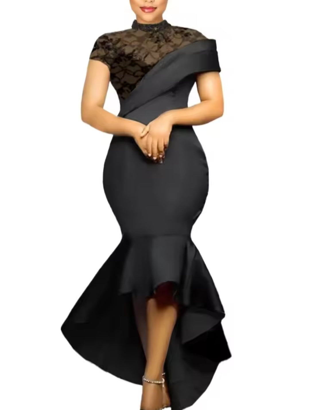 Black evening gown with lace detailing on a white background