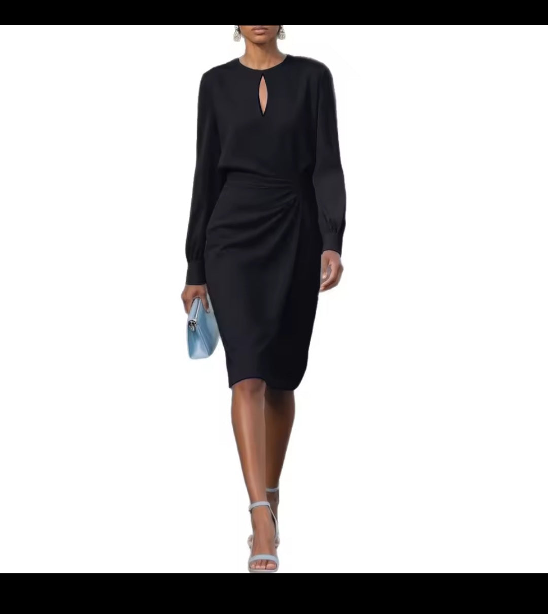 Woman wearing a black dress with a cutout detail on a white background