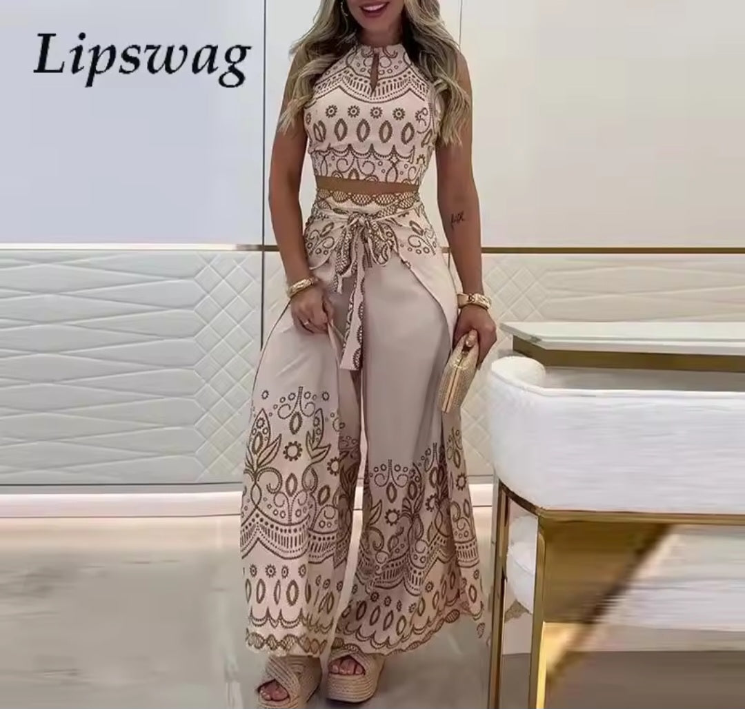 Woman wearing a beige lace dress with a white background, featuring the brand 'Lipswig'.