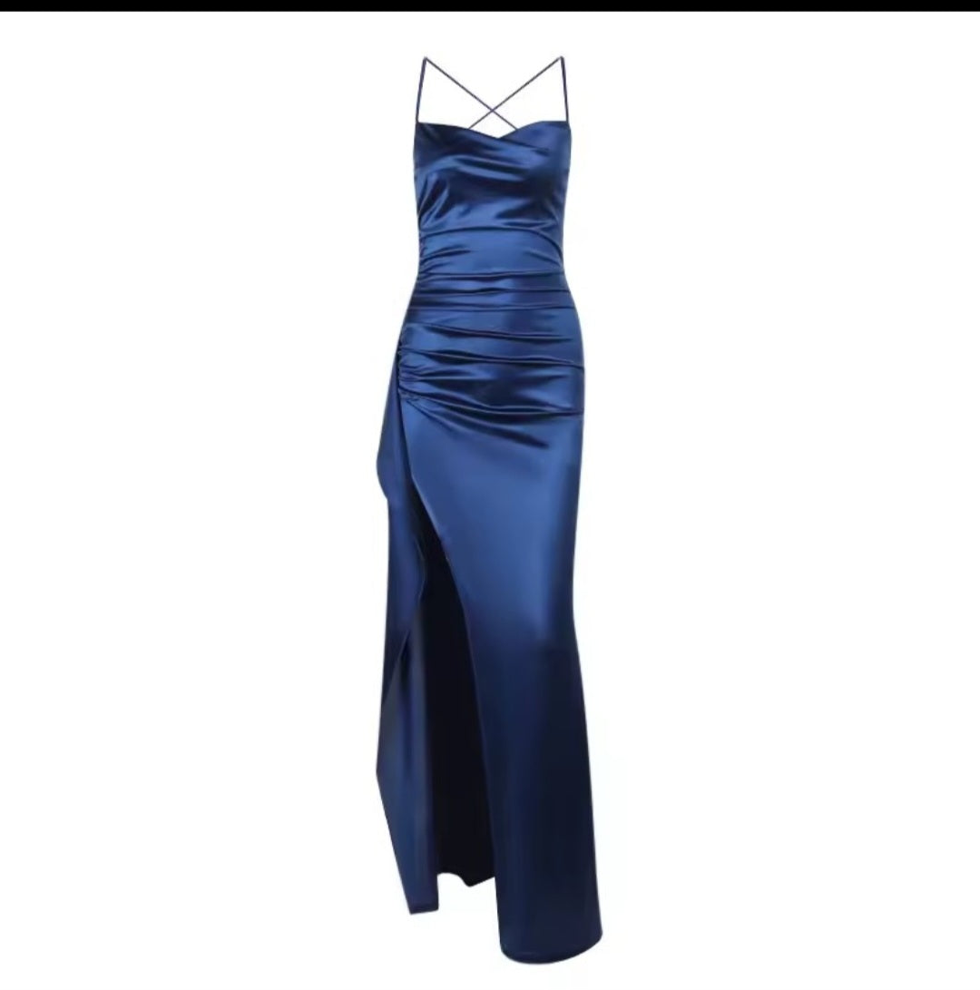 Blue satin evening gown with thin straps on a white background