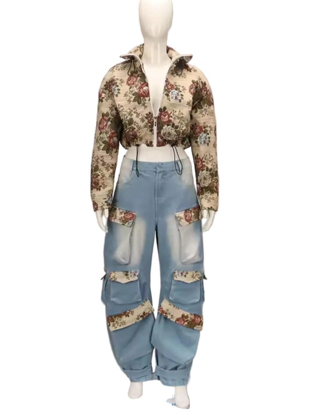 Mannequin wearing a floral jacket and blue jeans on a plain background
