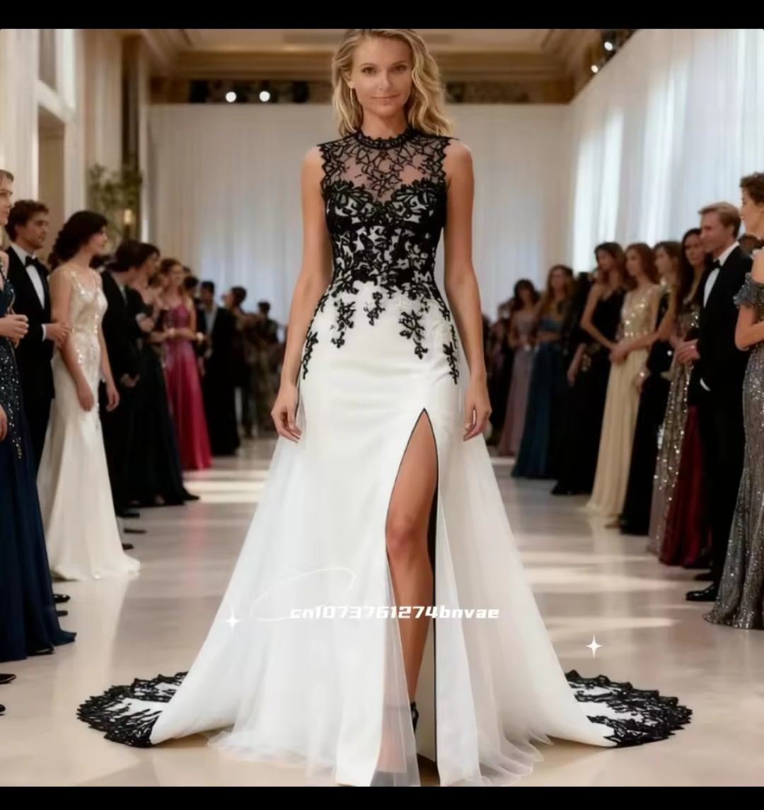 Woman in a black and white evening gown at a formal event