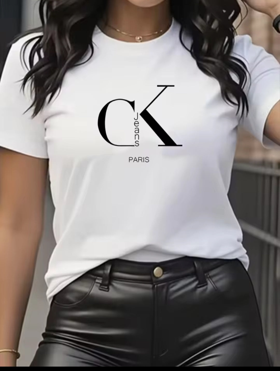 Model wearing T-shirt with CK Paris