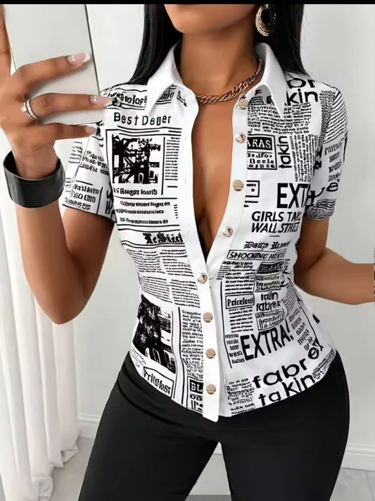 Person wearing a white shirt with black text and graphics