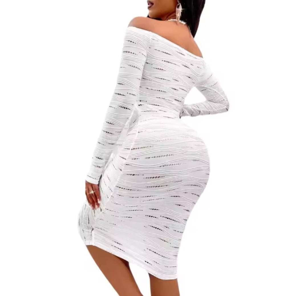 White off-shoulder dress with long sleeves on a white background