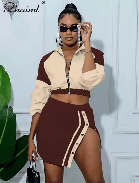 Woman wearing a two-tone outfit with a brand logo in the corner