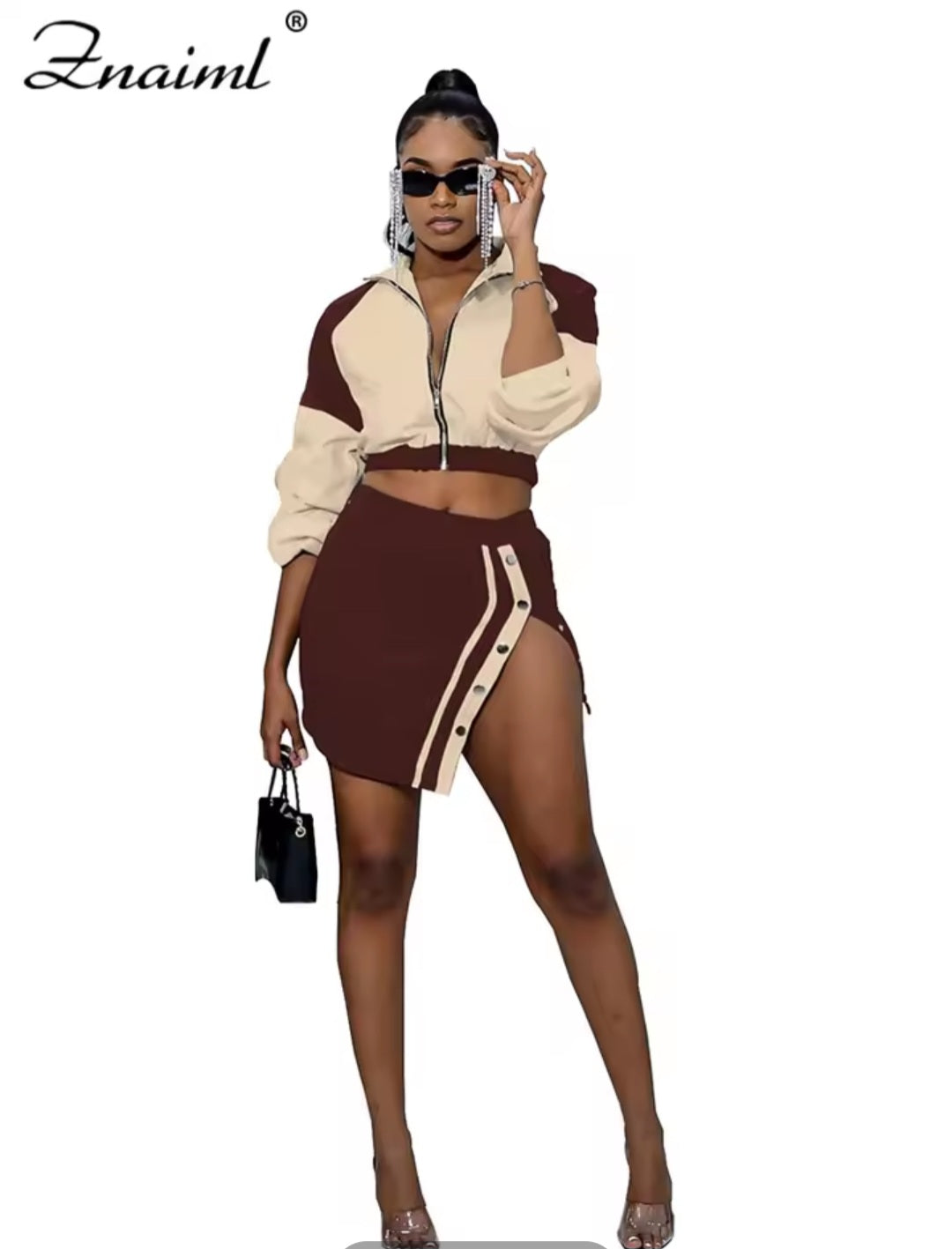 Woman wearing a brown and beige outfit with 'Znaiml' branding.