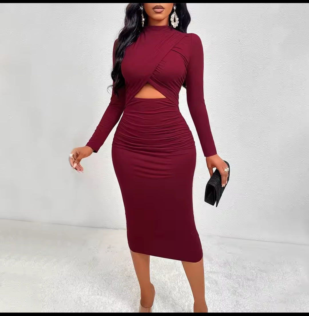 Maroon dress with cut-out design worn by a model on a white background