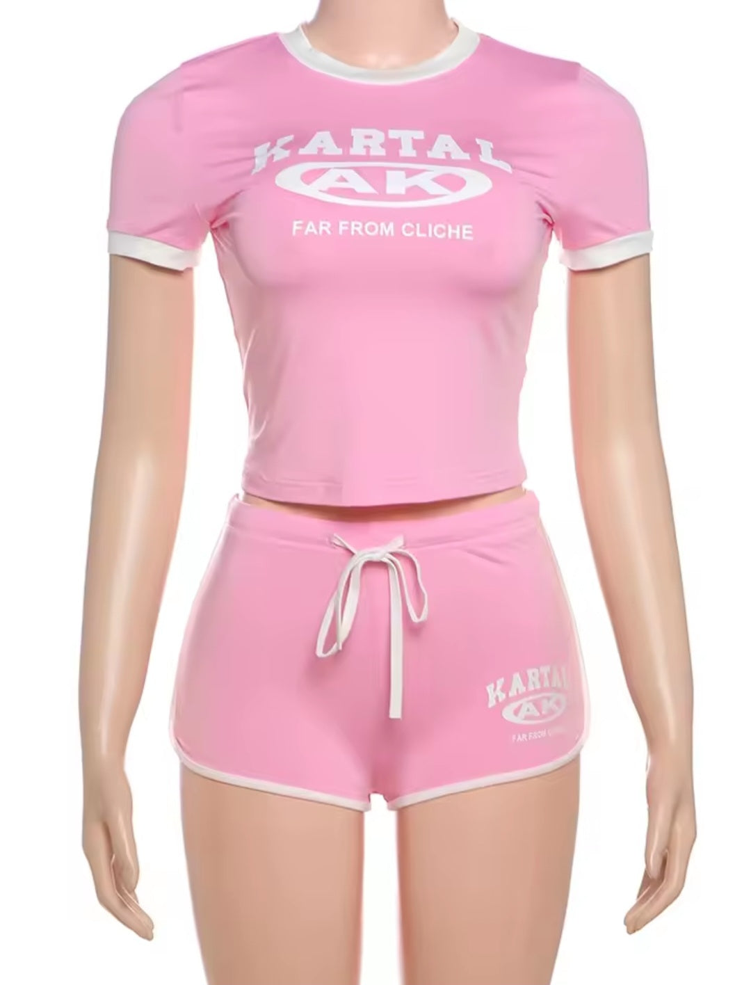 Pink athletic outfit with 'Kartal AK' branding on a mannequin against a white background