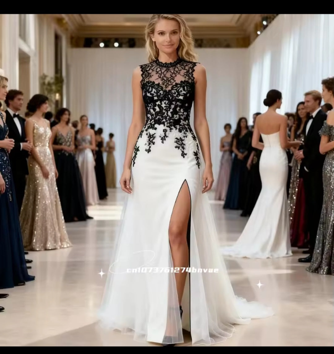 Woman in a black and white evening gown at a formal event